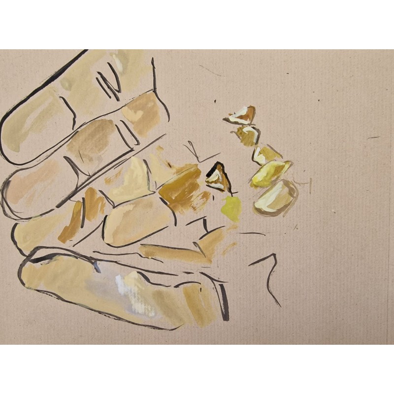 Pepitas de oro en la mano