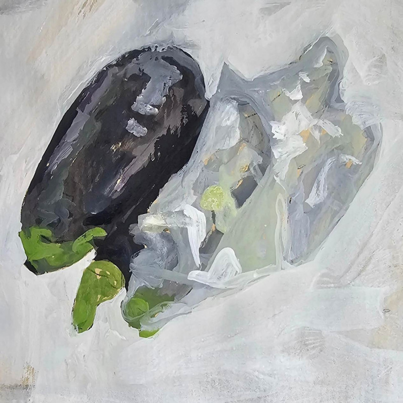 Berenjena golpeada de la basura del supermercado